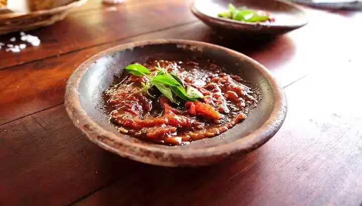sambal terasi with lemon basil on top